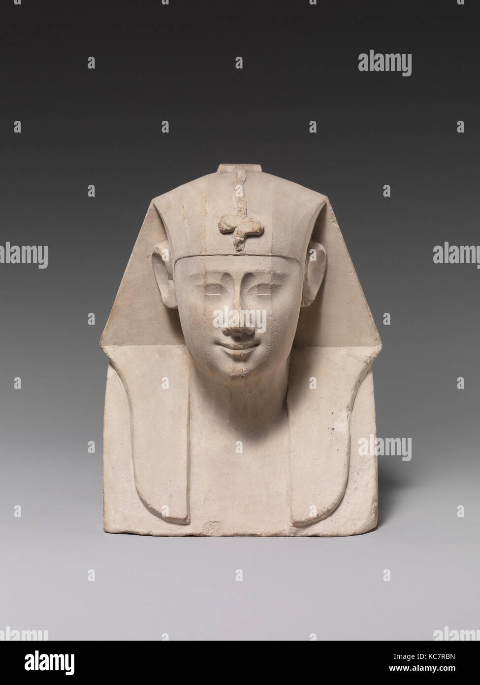 Bust of a royal figure with downward-hanging snake, 400–200 B.C Stock Photo