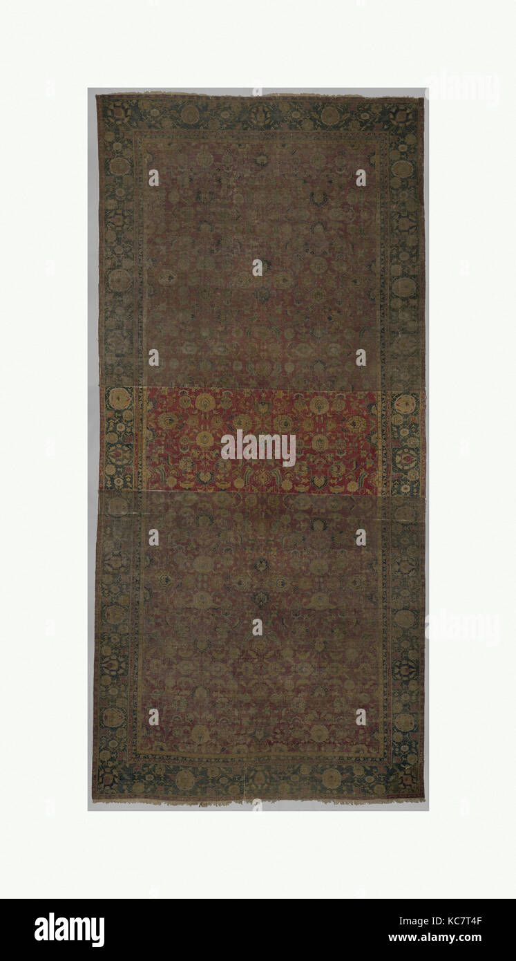 Indo-Persian carpet with repeat pattern of vine scrolls and palmettes., second half of the 17th century Stock Photo