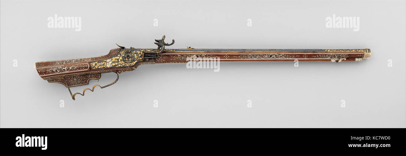 Wheellock Rifle, ca. 1640–50, Munich and Augsburg, German, Munich and Augsburg, Steel, gold, fruitwood, staghorn, bone, L. 41 7 Stock Photo