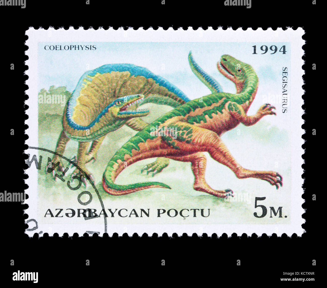Postage stamp from Azerbaijan depicting a coelophysis and a segisaurus Stock Photo
