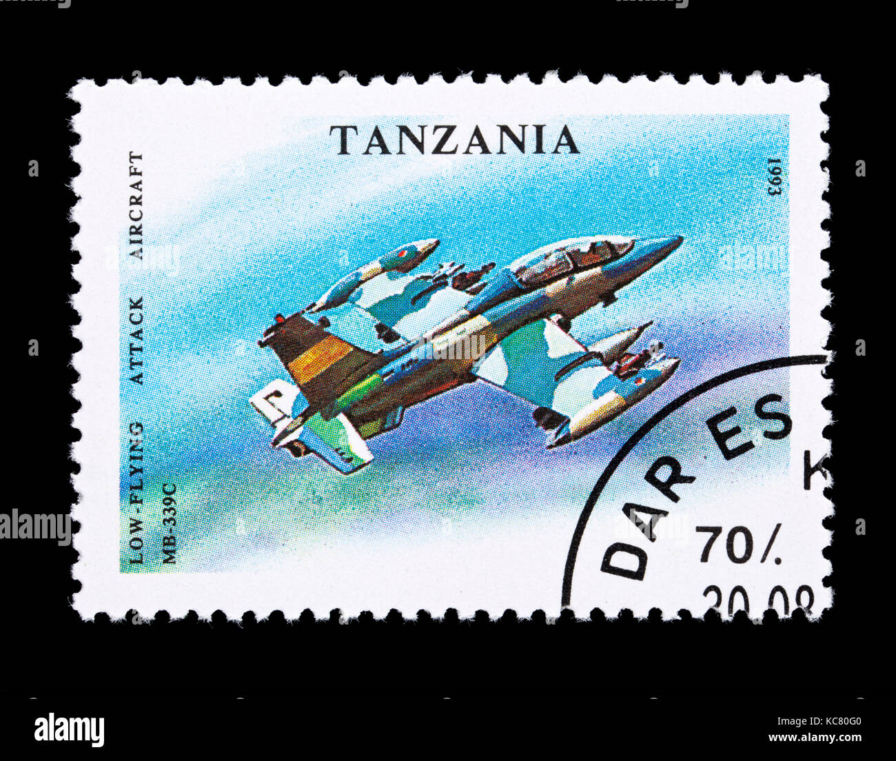 Postage stamp from Tanzania depicting a MB-339C low flying attack aircraft Stock Photo