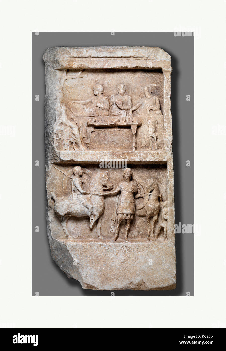 Marble grave relief with a funerary banquet and departing warriors, 2nd century B.C Stock Photo