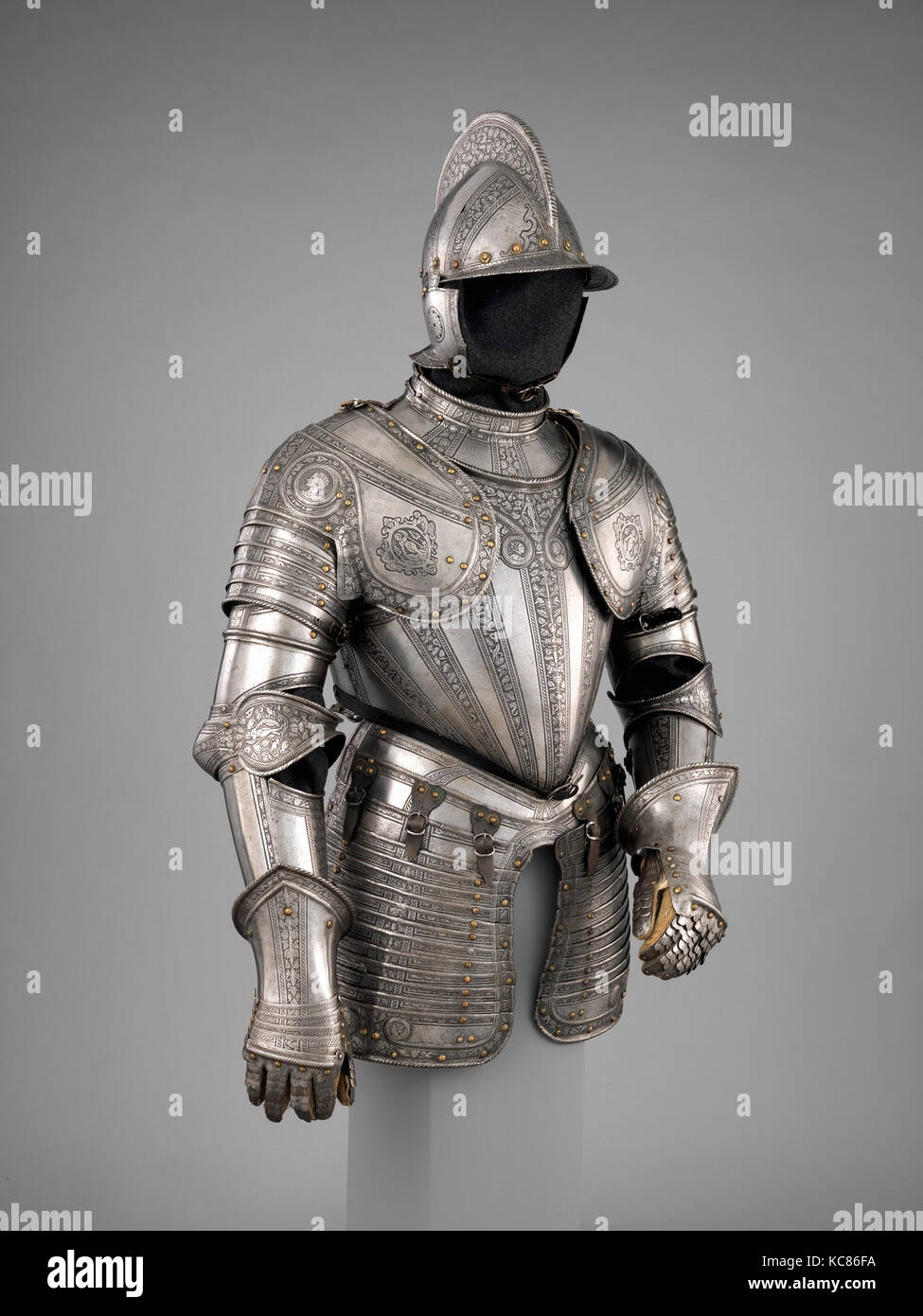 Infantry Armor, dated 1571; upper plate of the gorget, skirt lames, and cheek pieces, 1917 Stock Photo