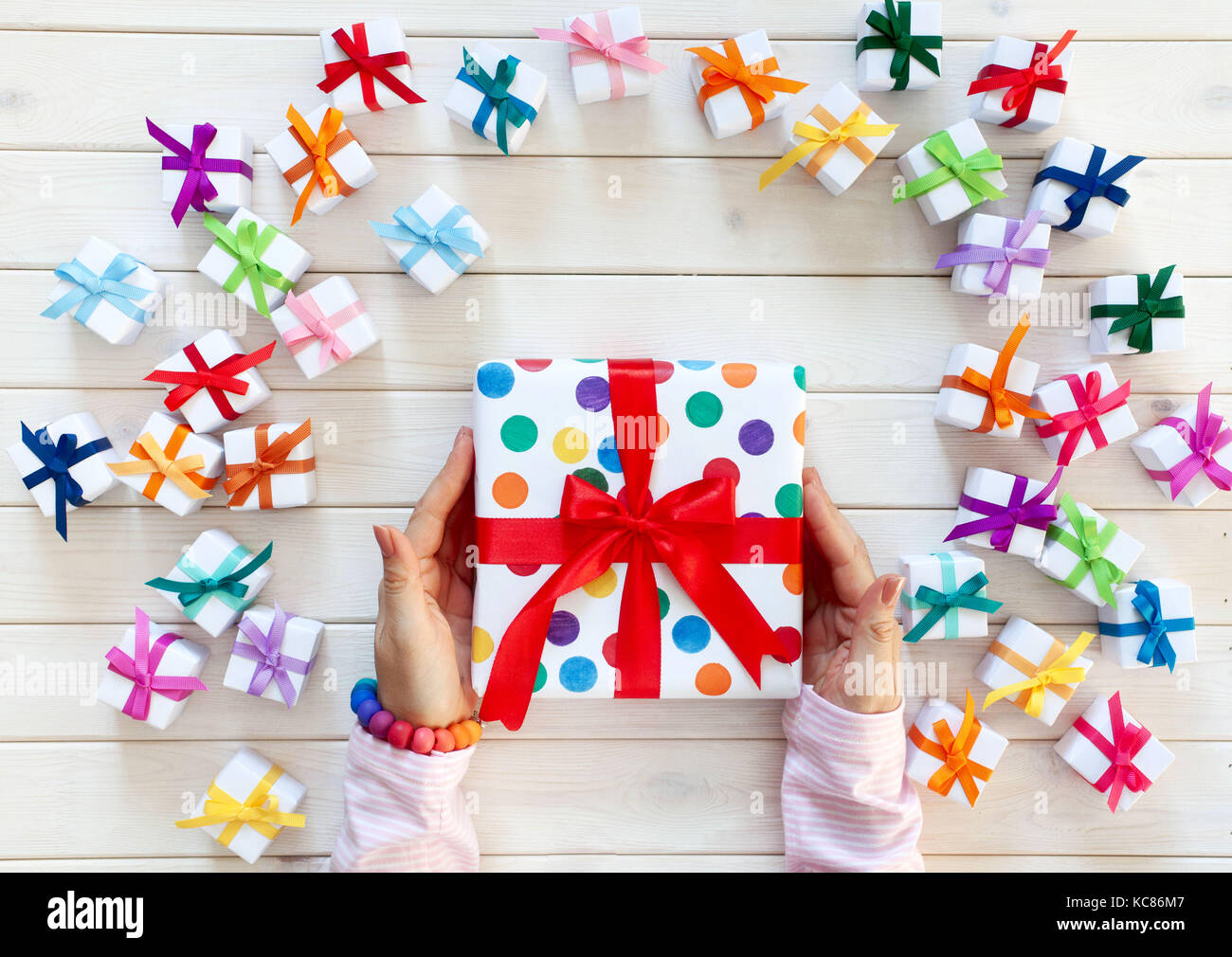 Colorful gift boxes on white background Stock Photo - Alamy