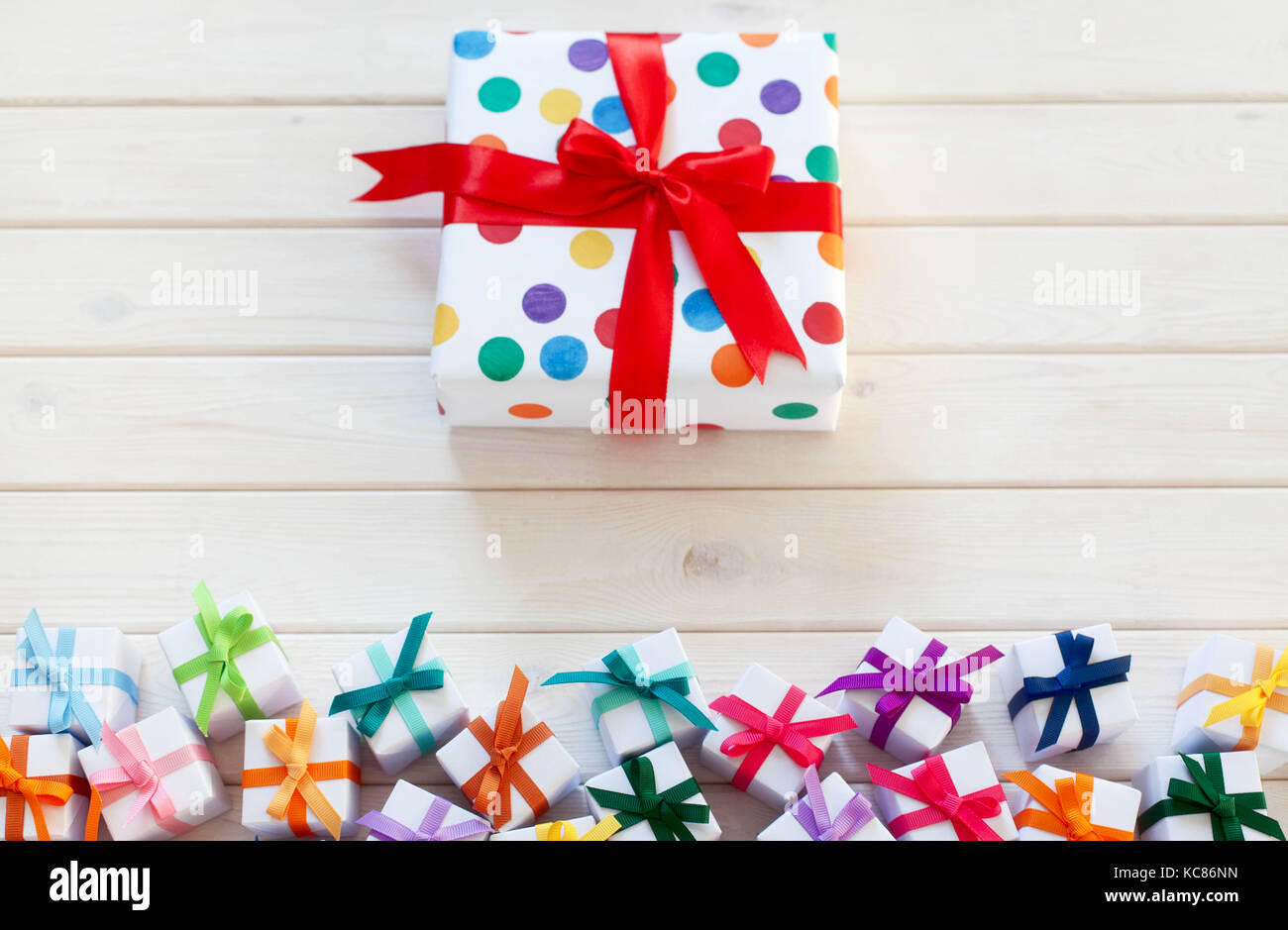 Colorful gift boxes on white background Stock Photo - Alamy