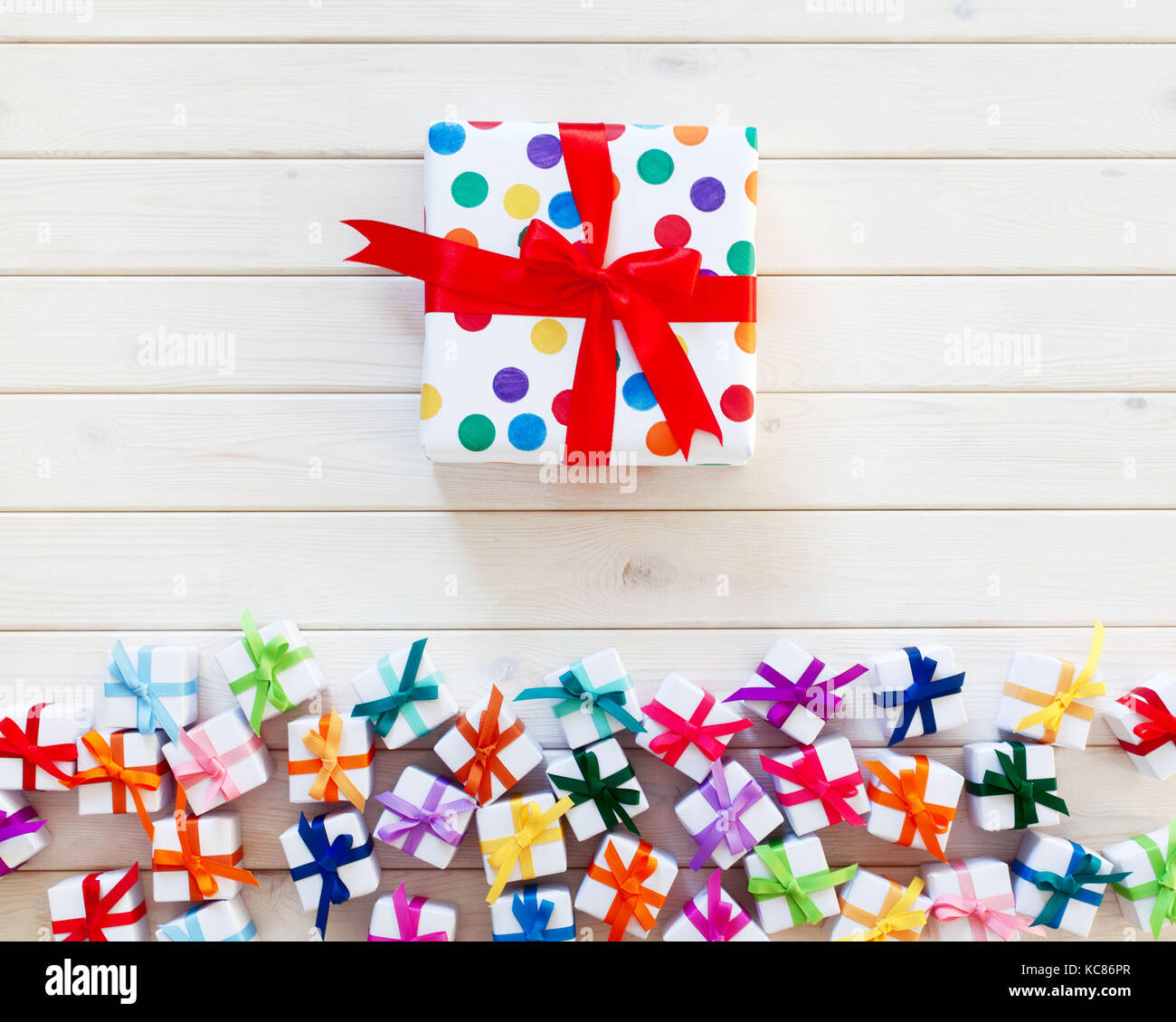 Colorful gift boxes on white background Stock Photo - Alamy