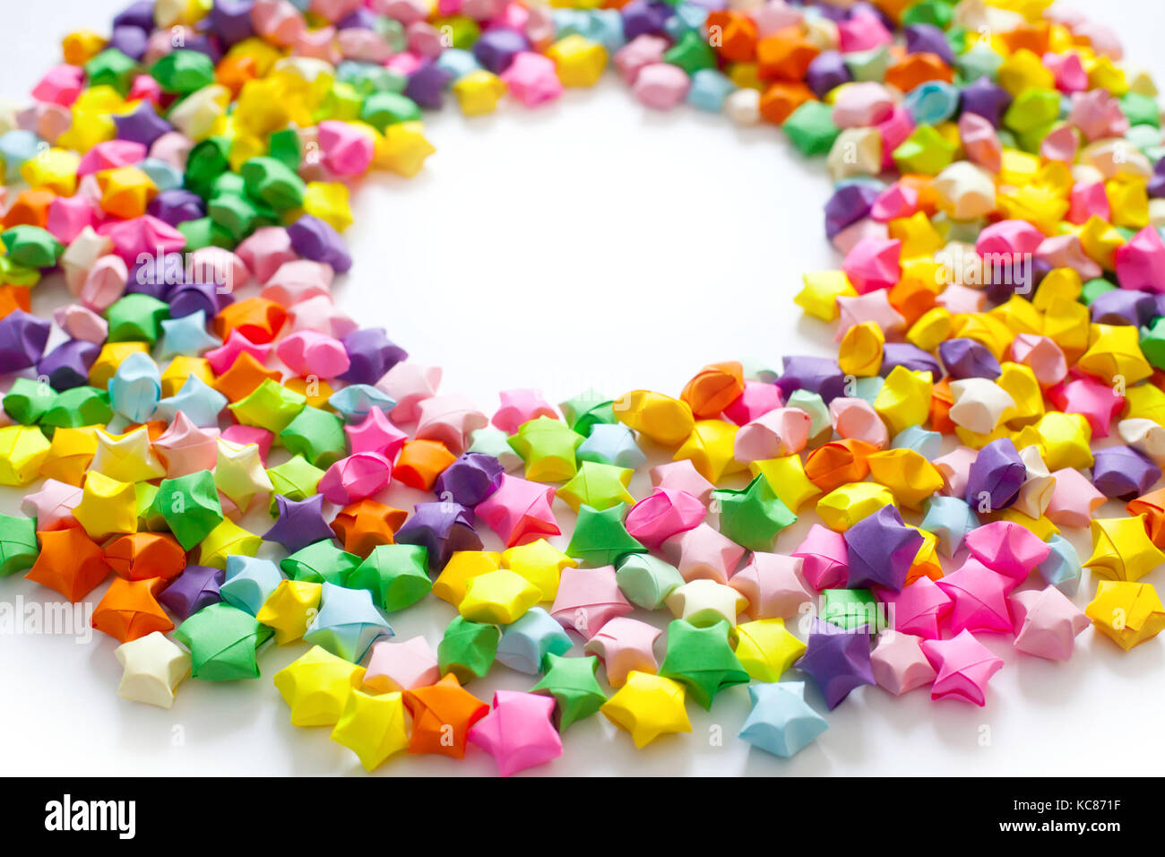 Colorful folded paper star or origami lucky star to use as frame Stock ...
