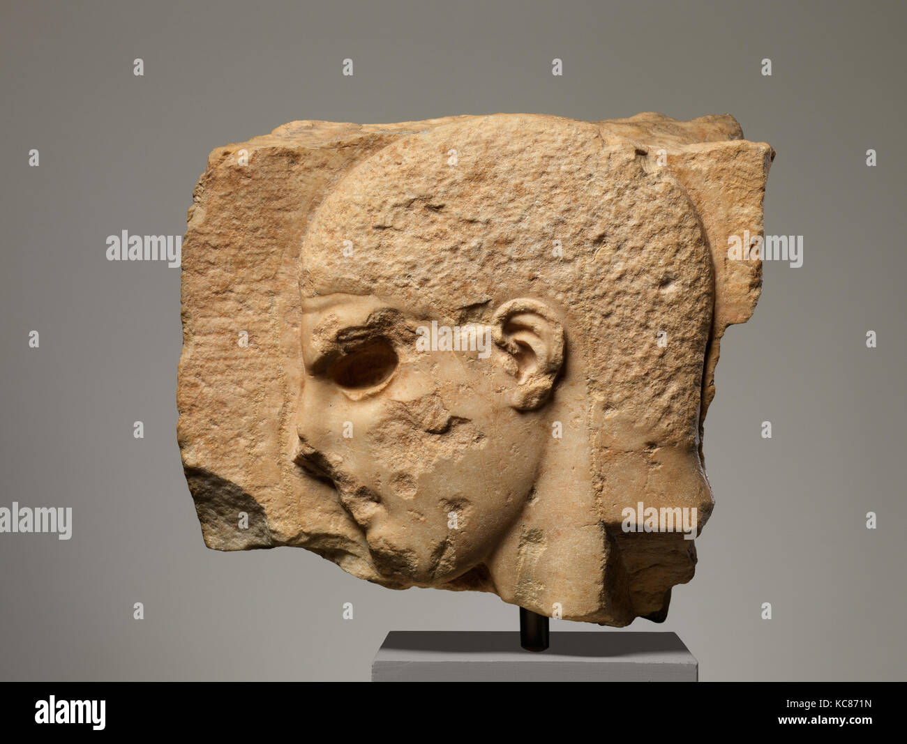 Fragment of a marble grave stele with the head of a youth, 1st quarter of the 5th century B.C Stock Photo