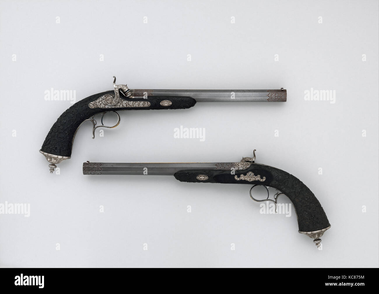Cased Pair of Percussion Pistols with Accessories, dated 1856 Stock Photo