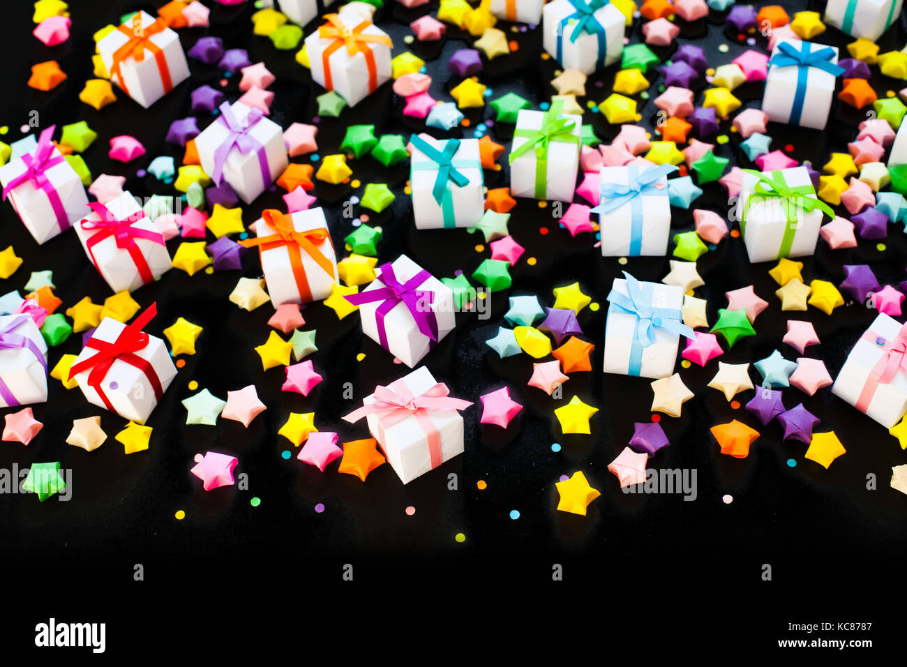 Colored gift boxes with colorful ribbons. Gifts for Christmas or a