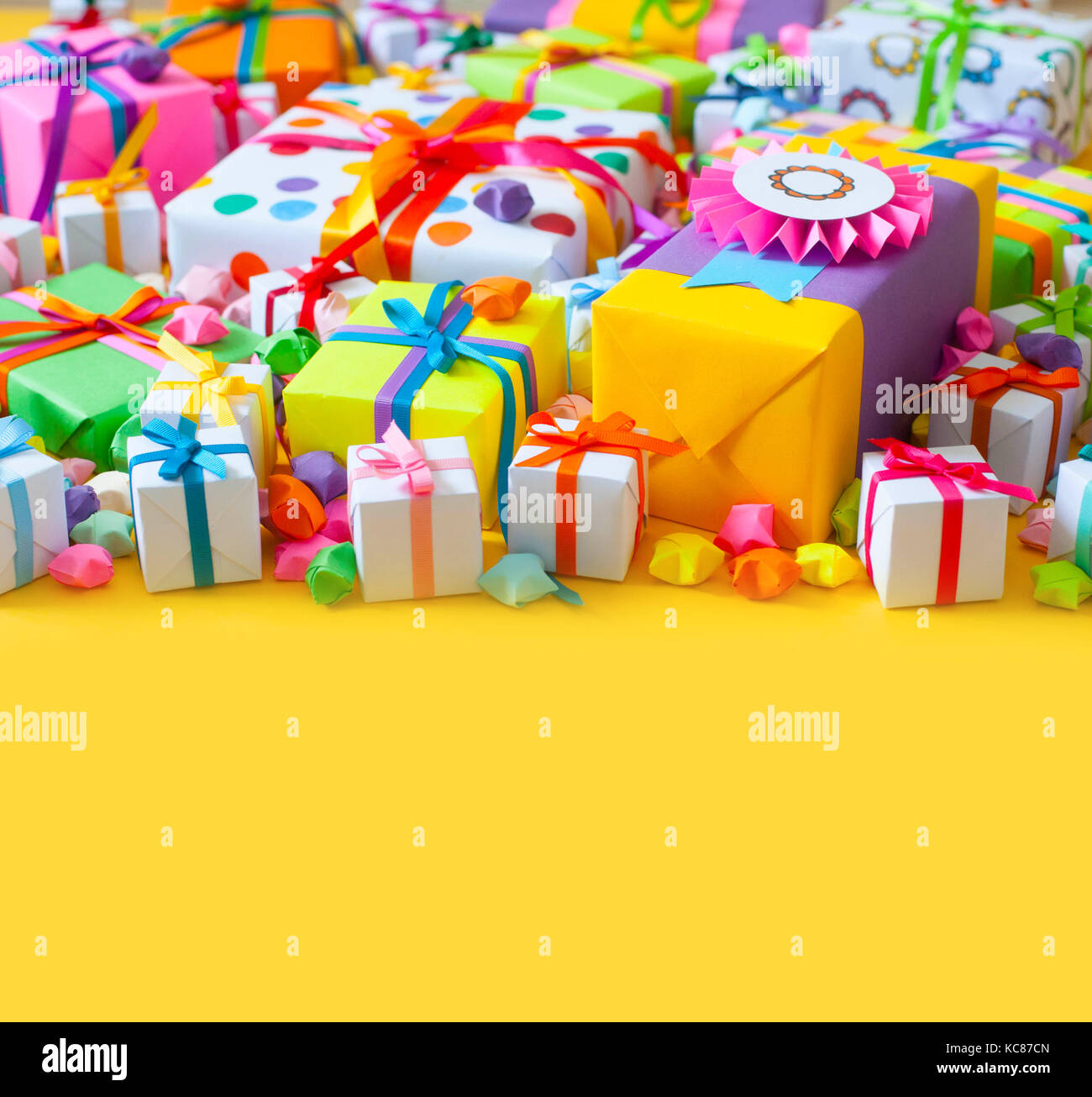 Download Colored Gift Boxes With Colorful Ribbons Yellow Background Gifts Stock Photo Alamy Yellowimages Mockups