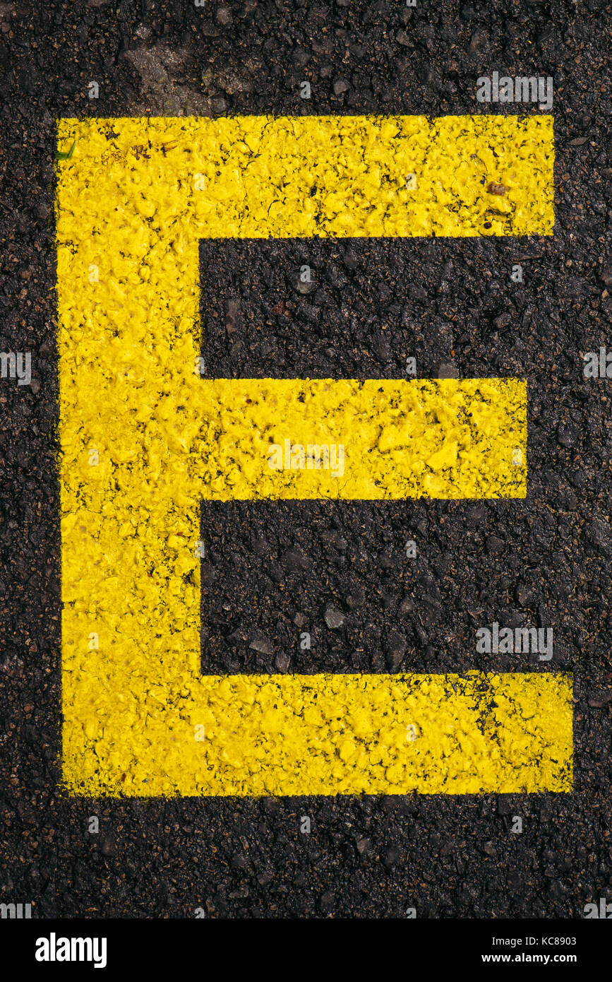 Letter E on asphalt road, top view Stock Photo