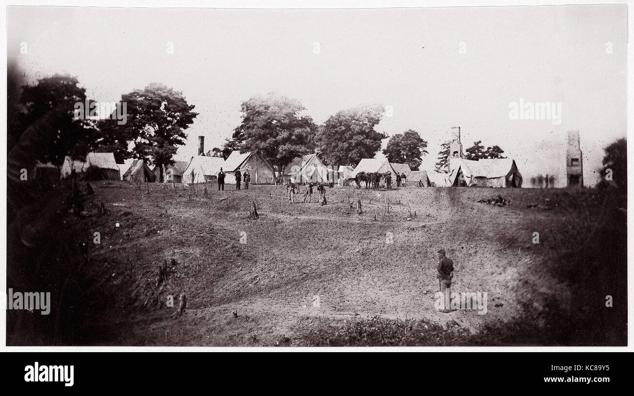 Unidentified camp with ruined chimneys in background.  Brady album, p. 130, 1861–65 Stock Photo