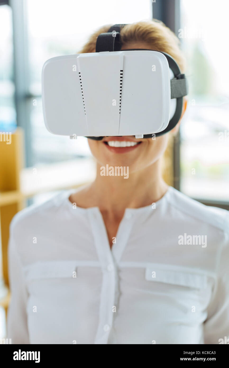 Cheerful woman wearing vr hi-res stock photography and images - Alamy
