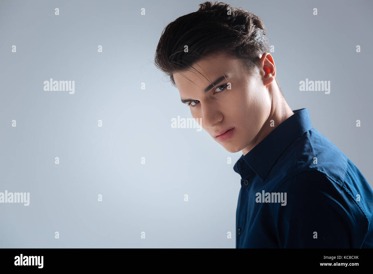 Strange male person posing on camera Stock Photo - Alamy