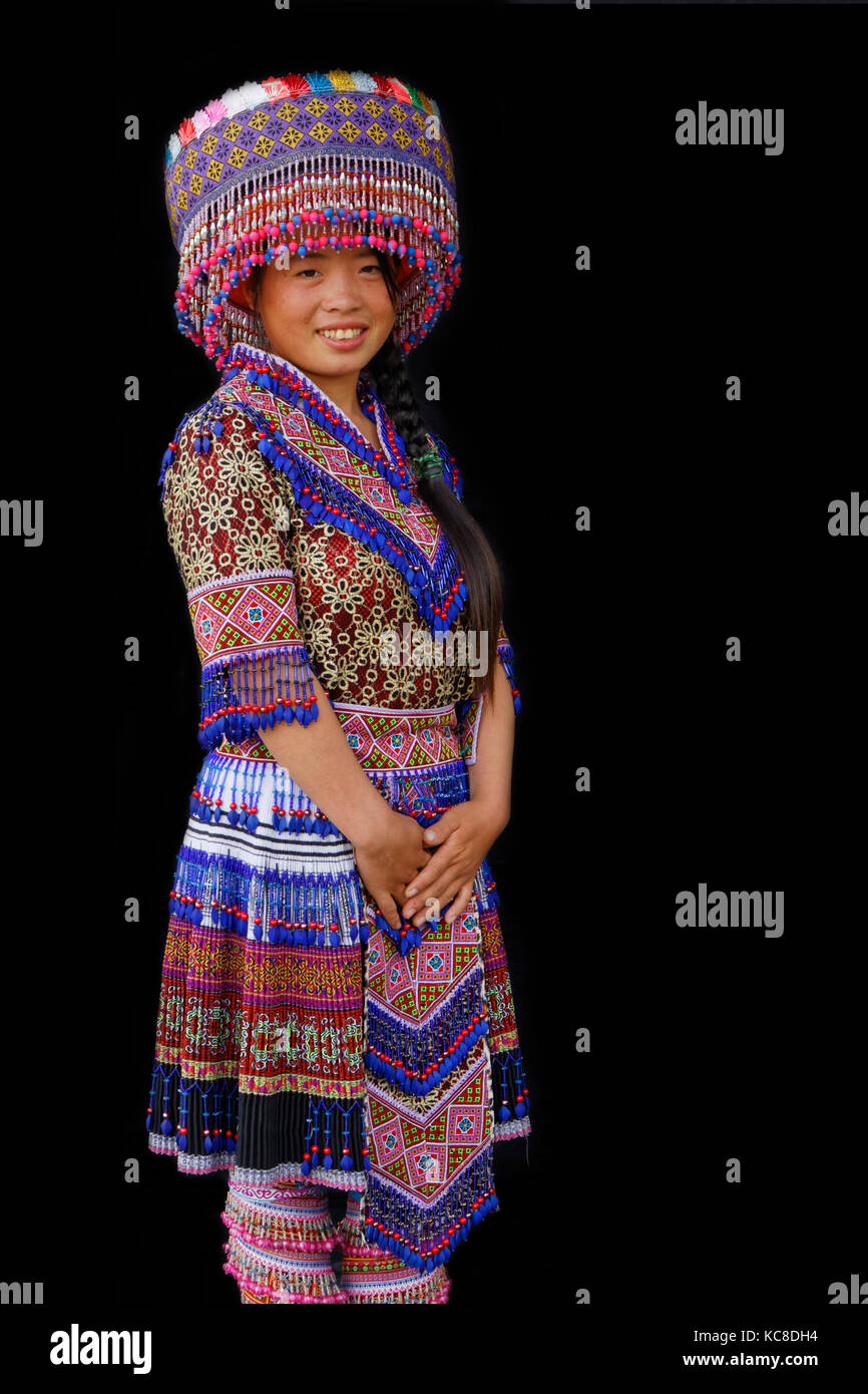 SIN CHENG, VIETNAM, October 26, 2016 : A young H'Mong lady. Women of North Vietnam mountains wear their best traditional clothes when going to the vil Stock Photo