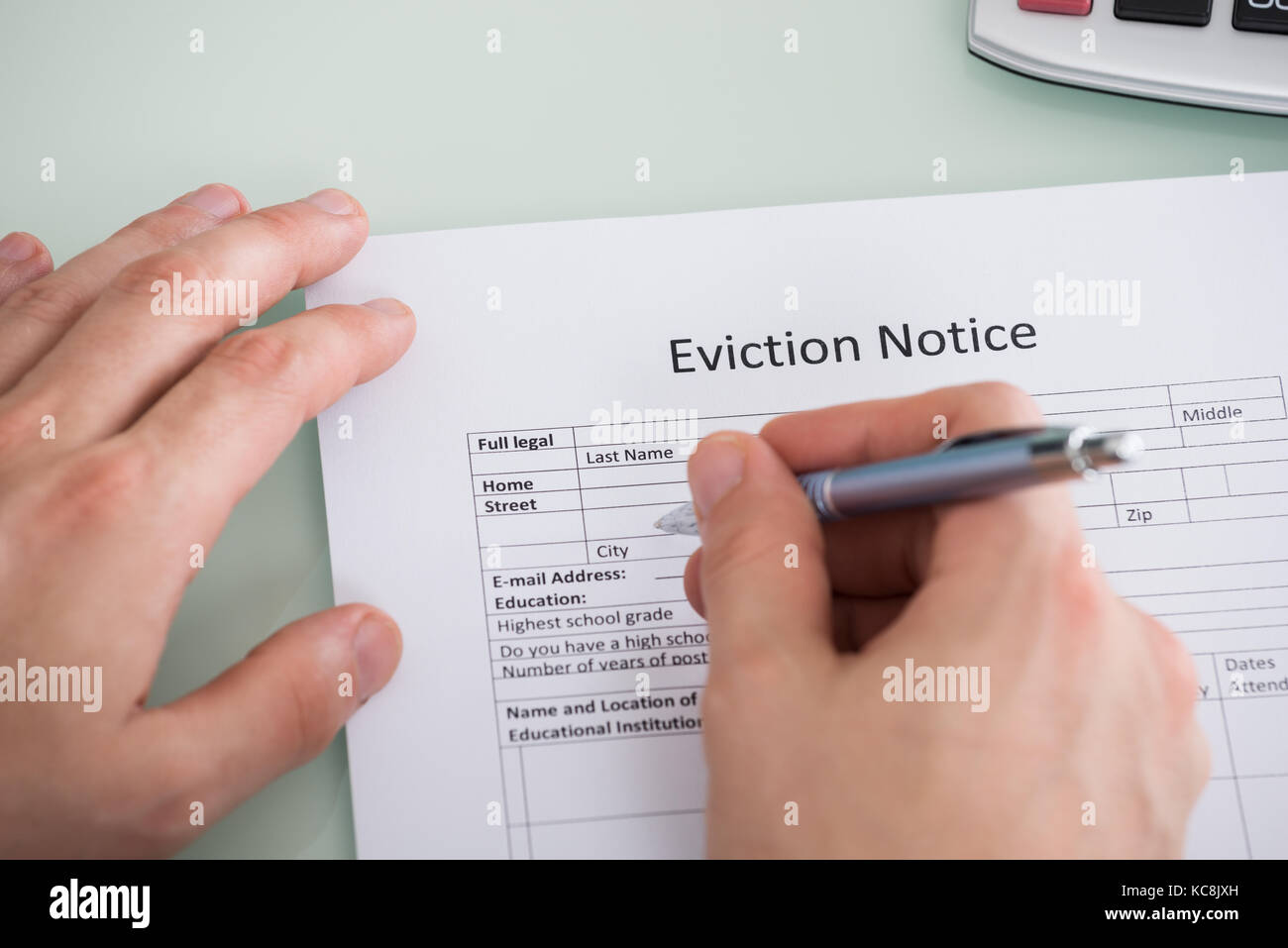 Form ... Stock Person Eviction Hand Filling Close-up Notice Of Hand Eviction ... Person Stock Form Notice Of Close-up Filling