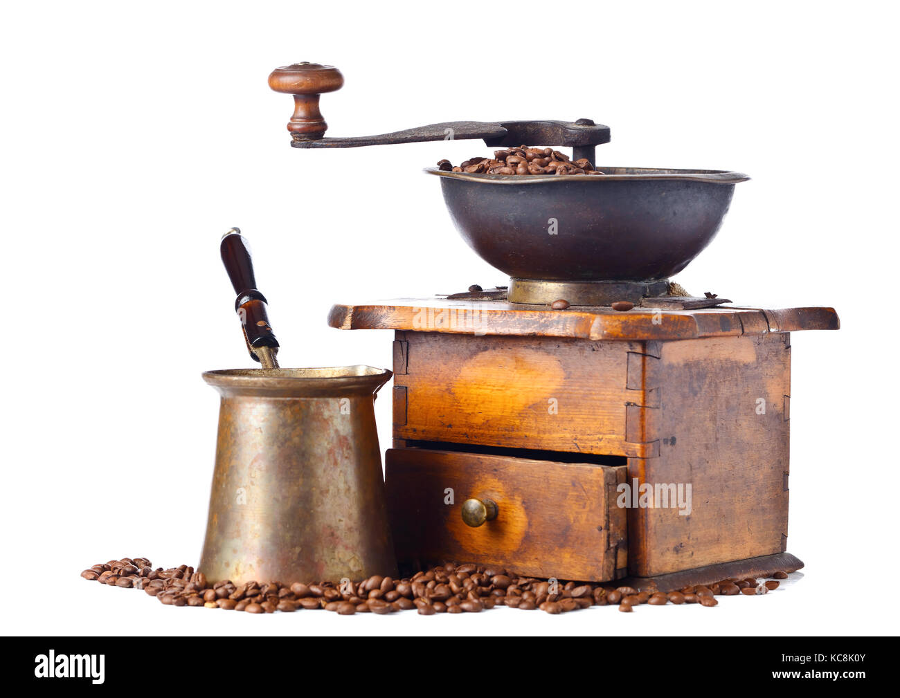 https://c8.alamy.com/comp/KC8K0Y/old-coffee-grinder-coffee-maker-and-roasted-coffee-beans-isolated-KC8K0Y.jpg