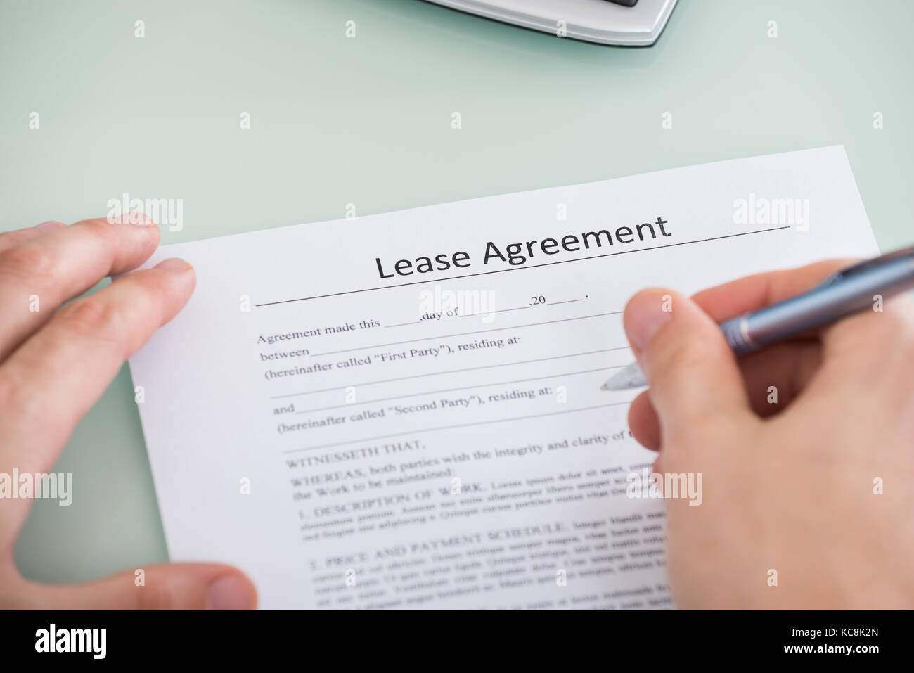 Sign Over Lease Paper.pdf Business lease agreement hi-res stock photography and images - Alamy