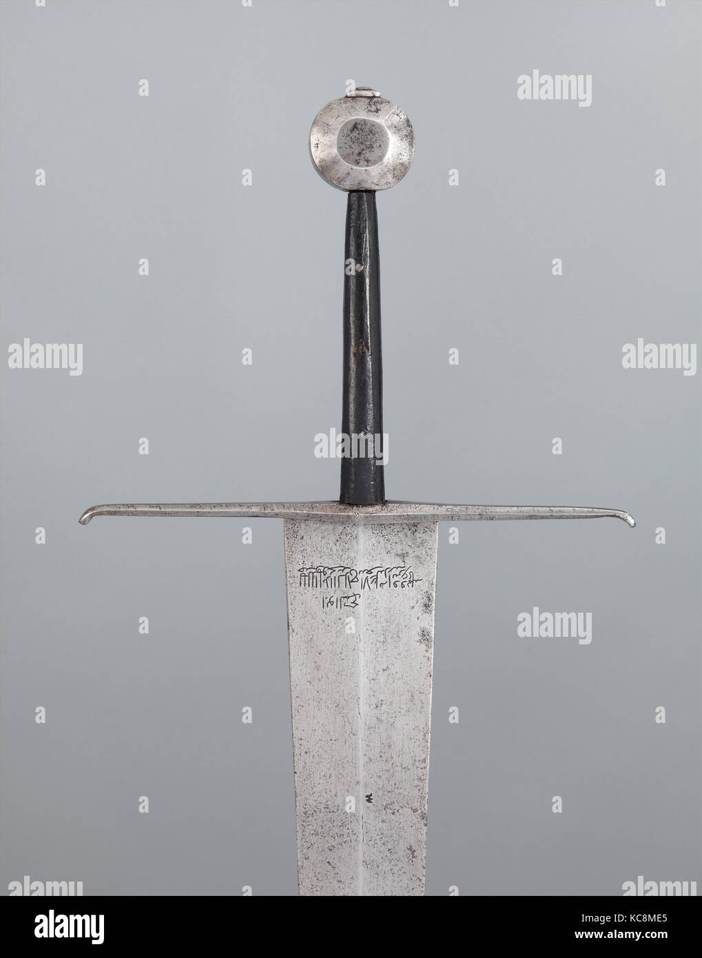 Sword, before 1419, European, Steel, wood, L. 43 11/16 in. (111 cm); L. of blade 34 1/8 in. (86.7 cm); W. 12 3/8 in. (31.4 cm Stock Photo