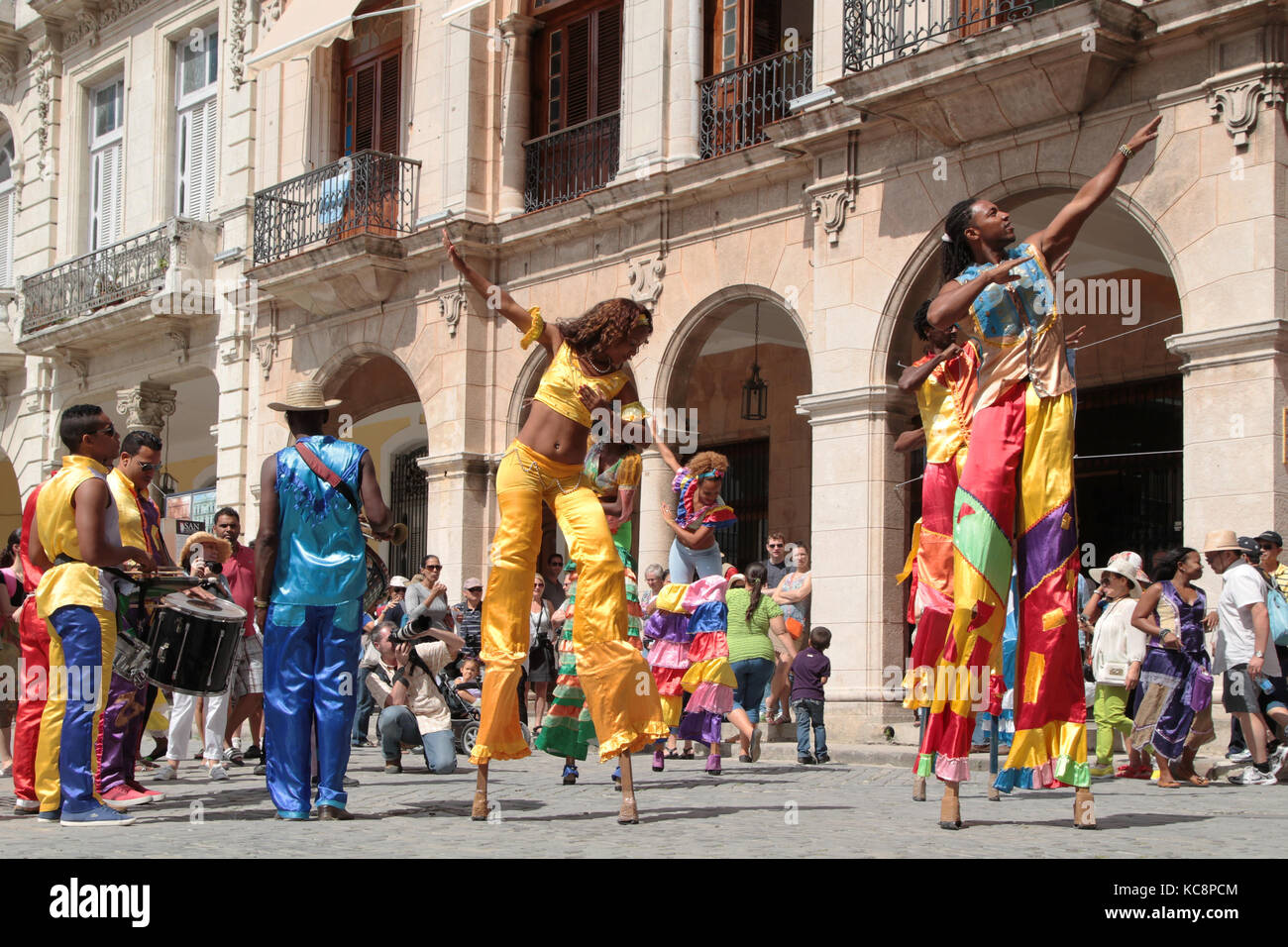 HAVANA, CUBA, FEBRUARY 16, 2014 : Stilt dancers in the streets of Havana. Havana is the largest city in the Caribbean and its center is inscribed on U Stock Photo