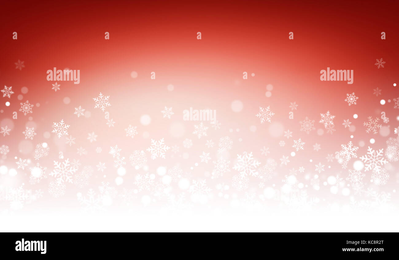 Snowflakes and snow powder on a frozen red background - Winter material Stock Photo