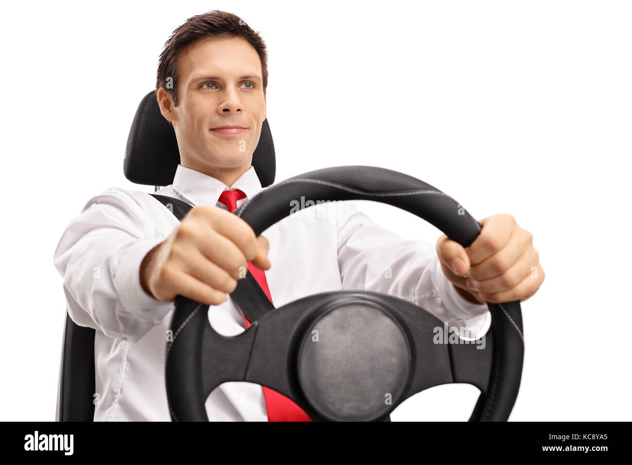 Elegant young man driving isolated on white background Stock Photo