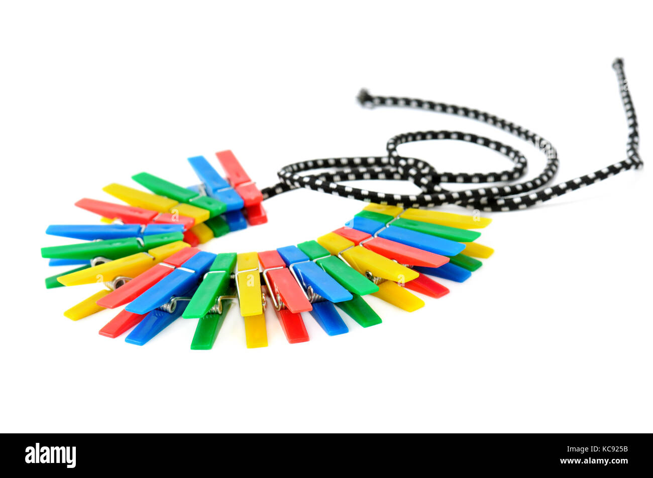 clothespins on a rope isolated on white background Stock Photo Alamy