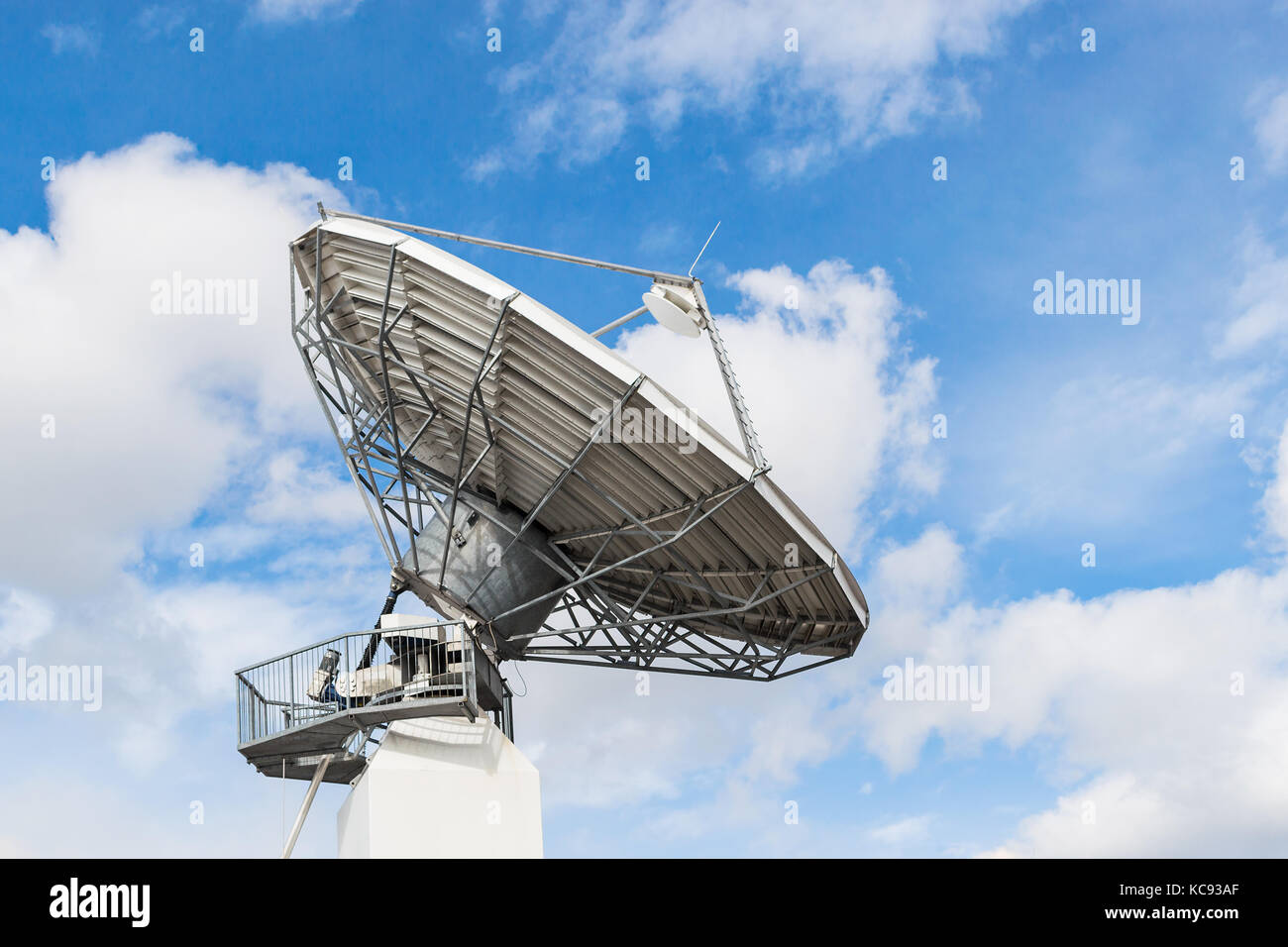 Parabolic satellite antenna dish for wireless radio signal data transfer Stock Photo