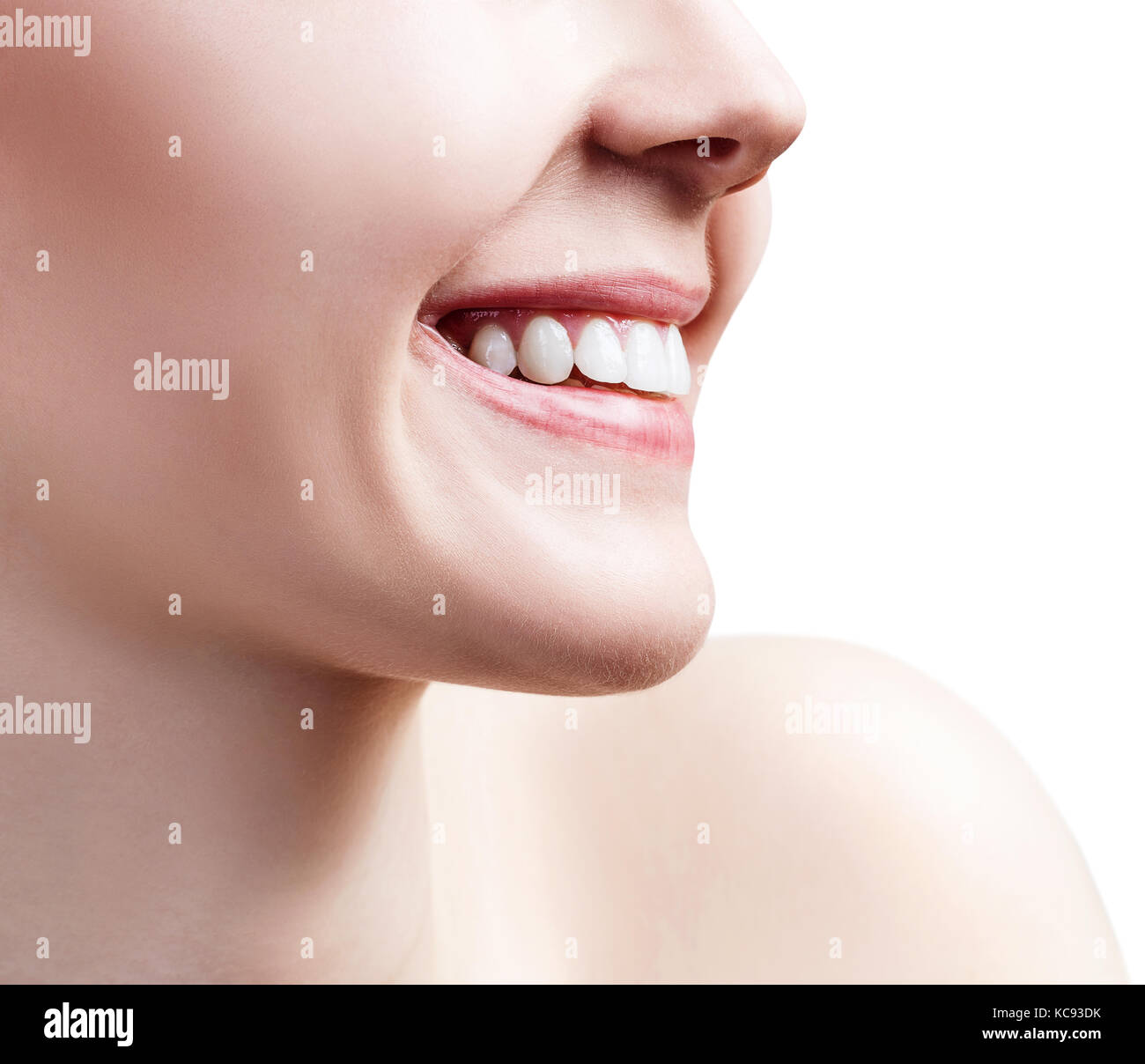 Face of young woman with healthy white teeth. Stock Photo