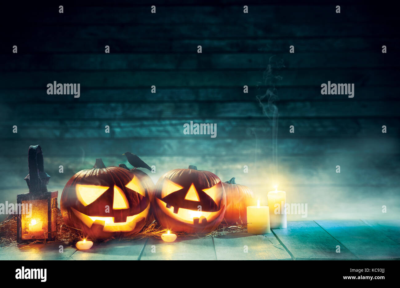 Spooky halloween pumpkins on wooden planks in dark cellar. Celebration ...