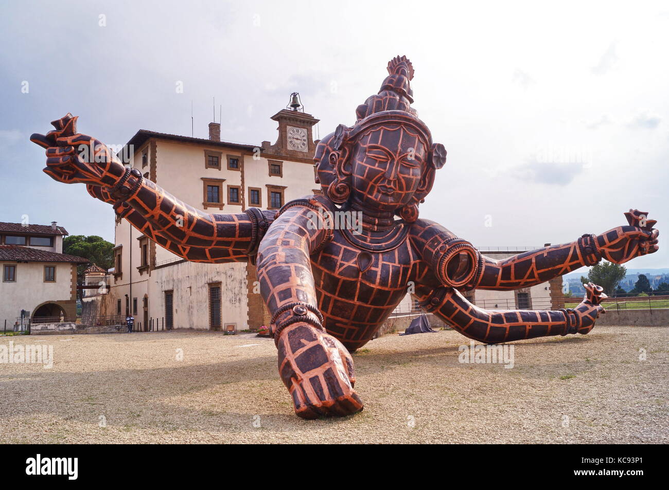 The sculpture entitled Three Heads Six Arms by Chinese artist Zhang Huan located in Forte di Belvedere Florence Italy Stock Photo