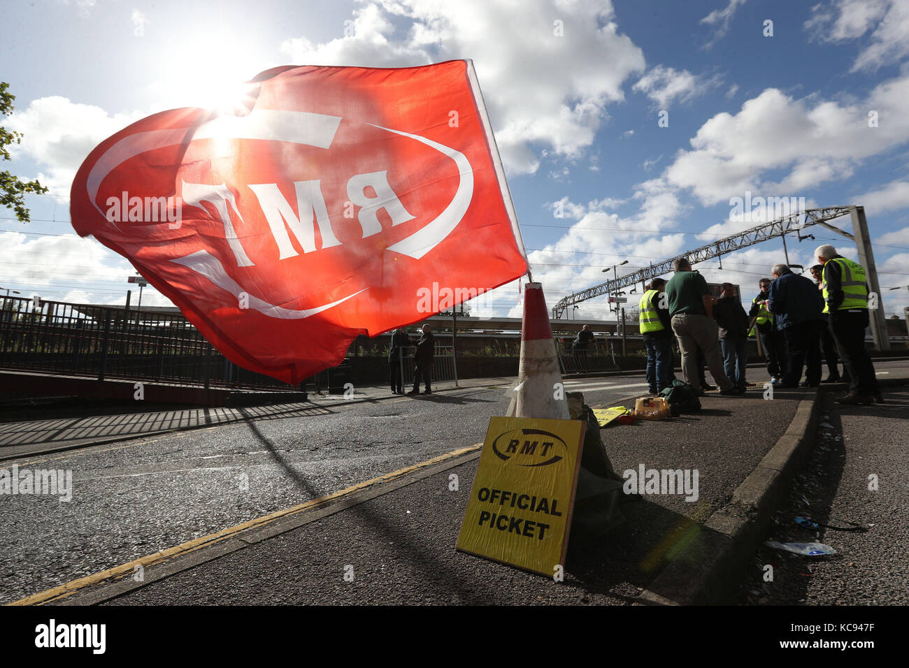 Members of the RMT union on the picket line as they stage a 24-hour strike at Colchester station, as workers on Southern, Merseyrail, Arriva Rail North and Greater Anglia are in disputes over the role of the guard. Stock Photo