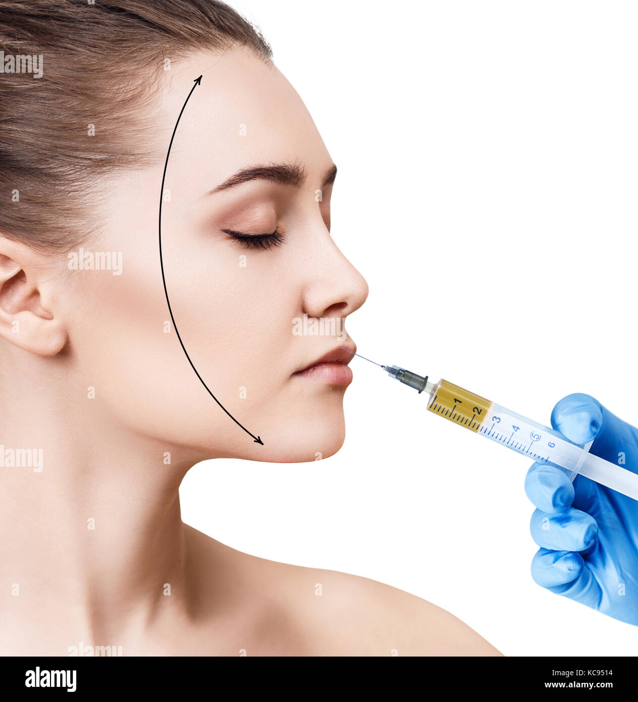 Beautiful woman gets injection in her lips. Stock Photo