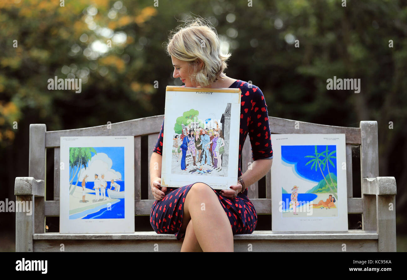 Auctioneer Catherine Southon holds examples from the Smilby cartoon collection, including works that appeared in Playboy, at the Ripley Arts Centre, Bromley, ahead of their auction next month. Stock Photo