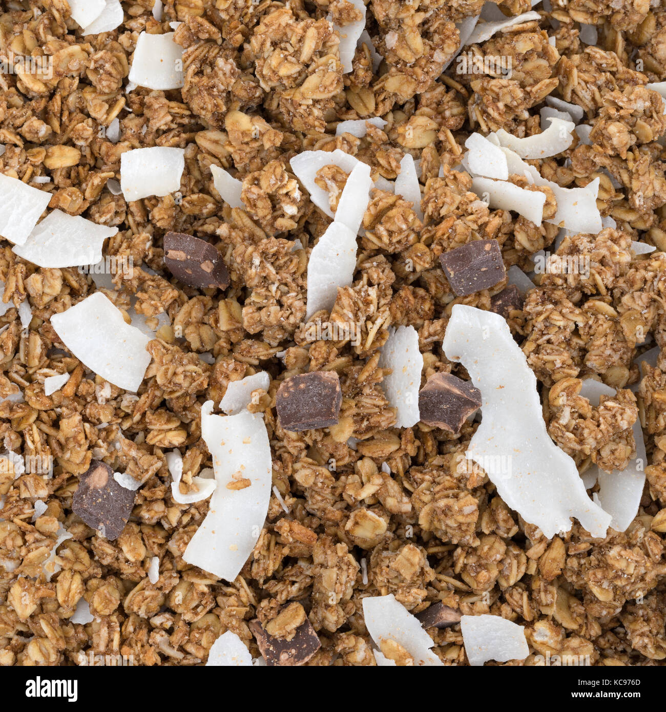 Close view of organic granola with chocolate and coconut flakes Stock