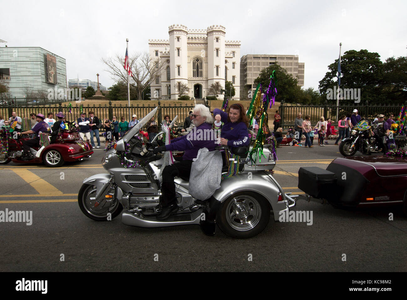 Baton Rouge, Louisiana, USA - 2016: A parade in front of the old Sate Capitol building during Mardi Gras celebrations. Stock Photo