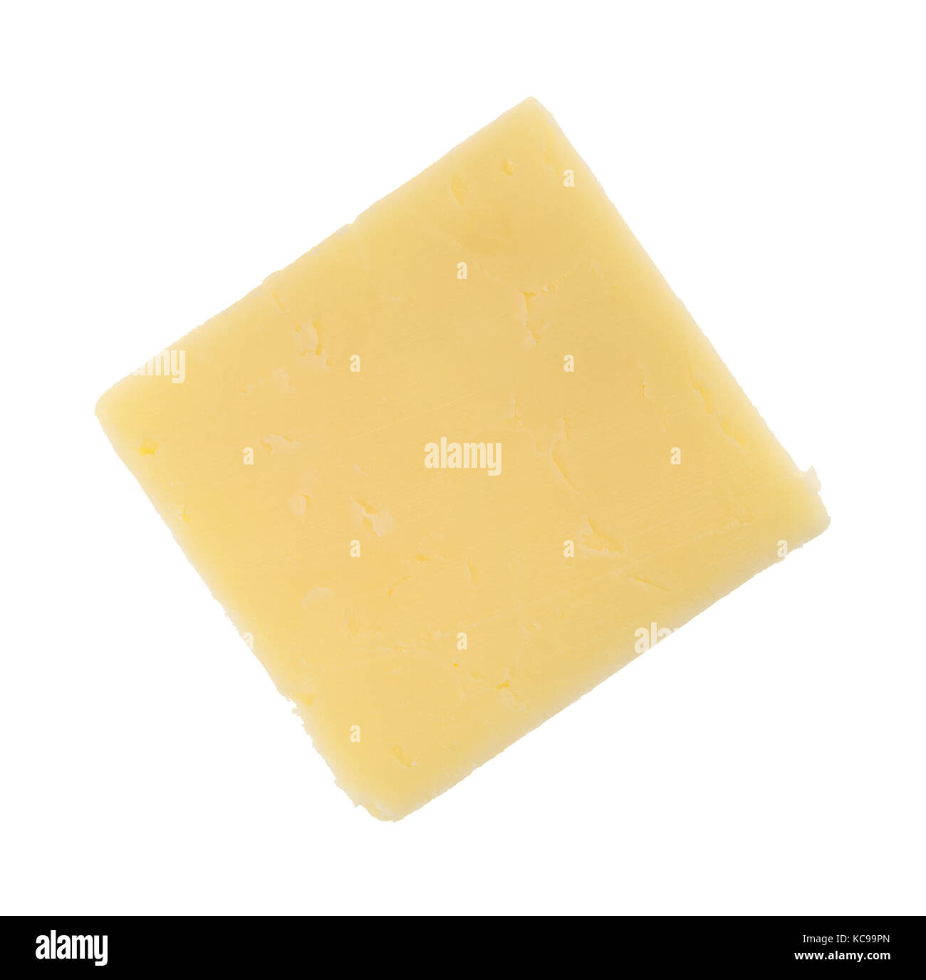 Top view of a single slice of a sharp cheddar cheese square isolated on