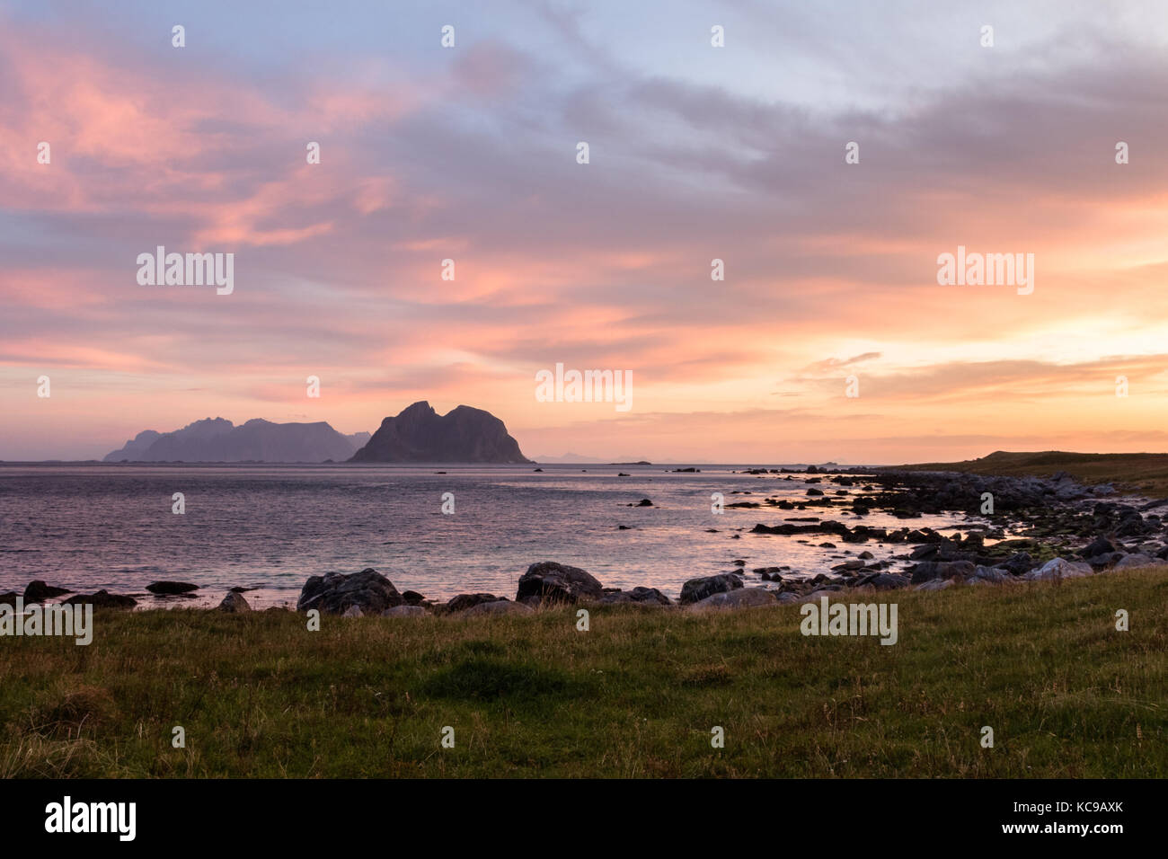 Scenic cloudscape with sunrise over the Lofoten islands in Norway in ...