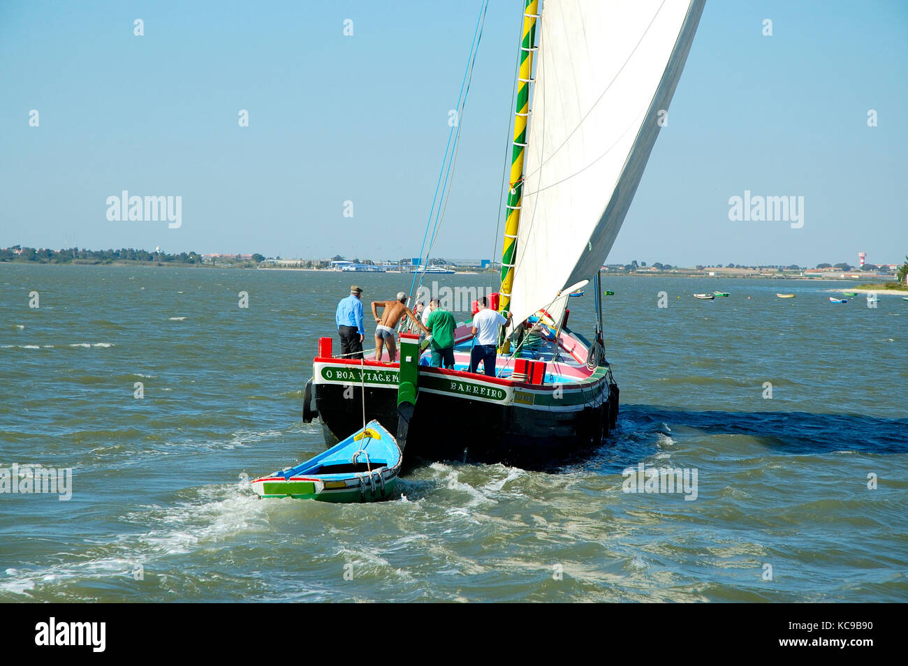 Traditional boat sailing in the Tagus river. Portugal Stock Photo