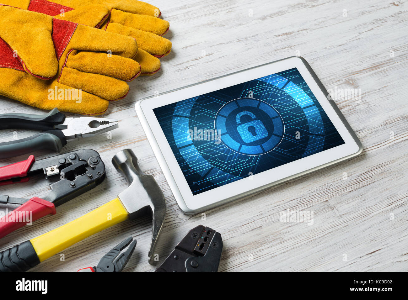 Web security and technology concept with tablet pc on wooden table ...