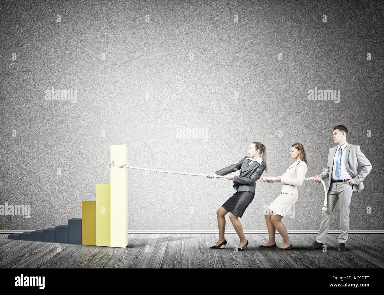Businessteam working in collaboration pulling graph with rope as symbol ...