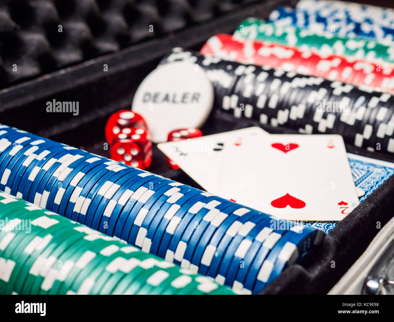 Set of poker chip or counter with card and dice in metal case. Gambling