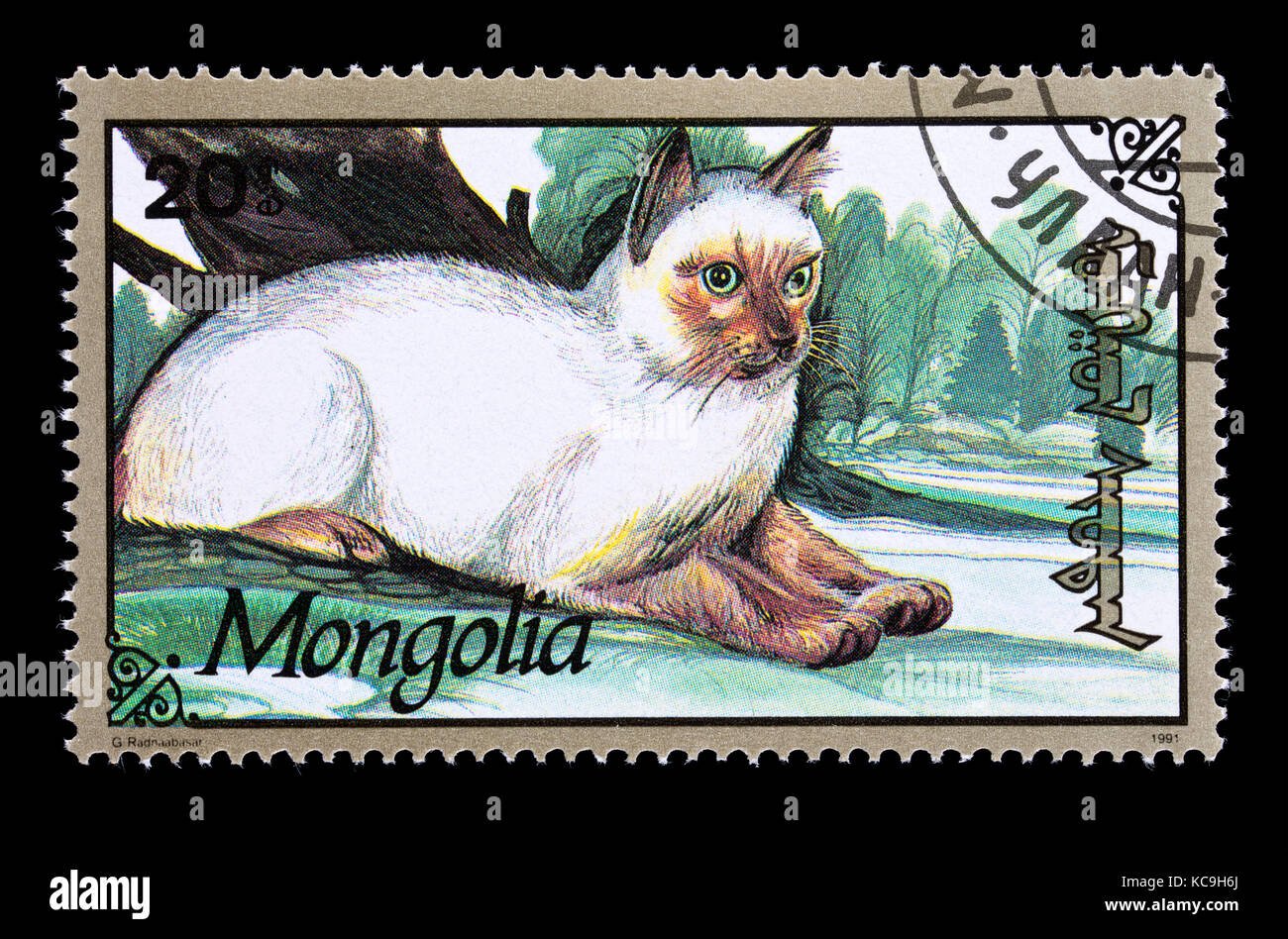 Postage stamp from Mongolia depicting a house cat. Stock Photo