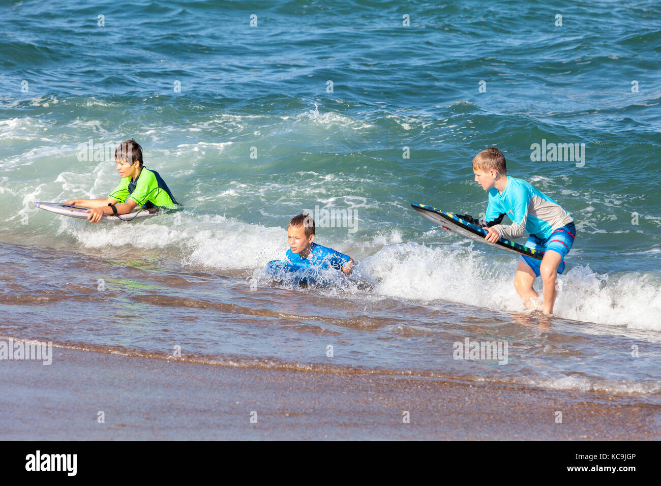 Children with boogie board hires stock photography and images Alamy