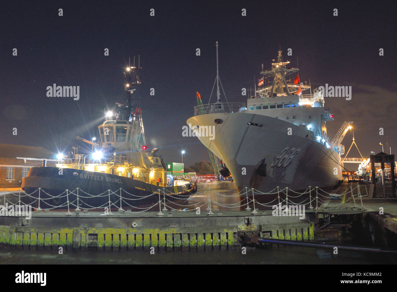 Chinese Navy Replenishment Ship PLAN Gaoyouhu AOR 966 arrives in the King George V Lock in London's Royal Docks at the start of a port call Stock Photo