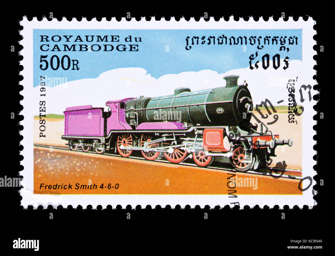 Postage stamp from Cambodia depicting a Frederick Smith 4-6-0 steam locomotive. Stock Photo