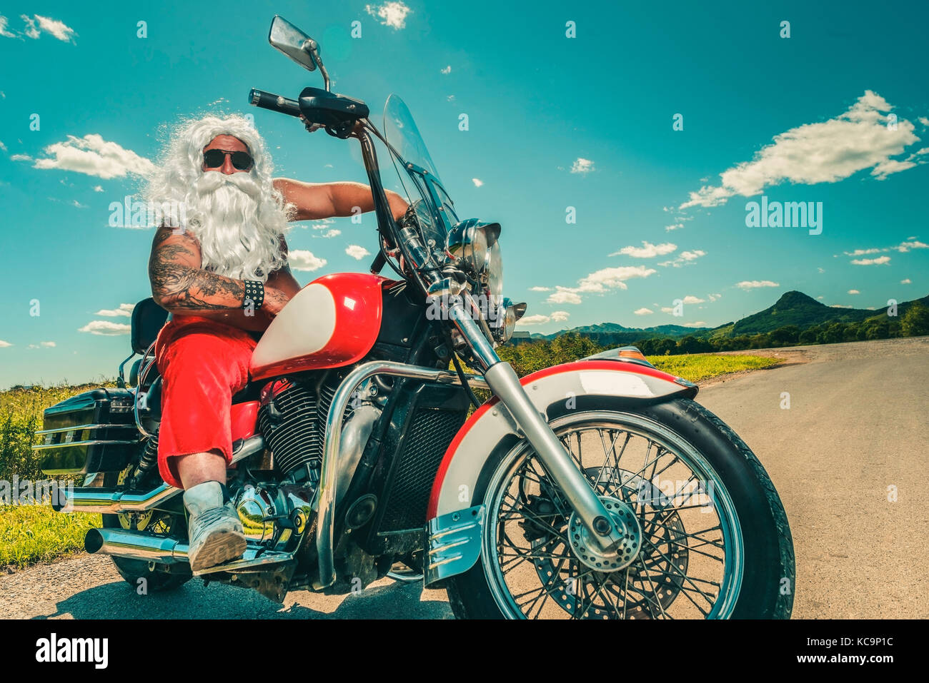 Santa on a motorcycle Stock Photo