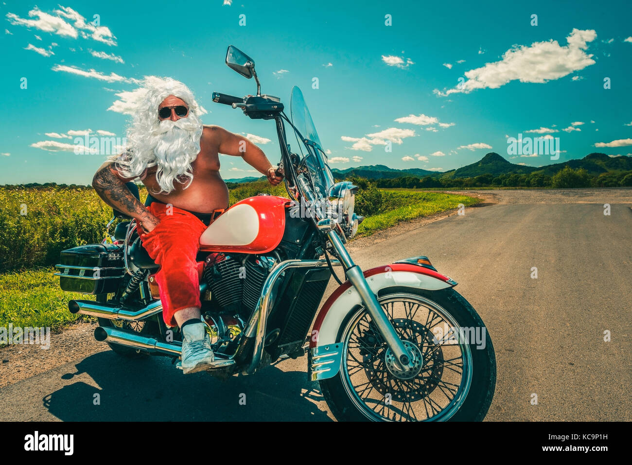 Santa on a motorcycle Stock Photo