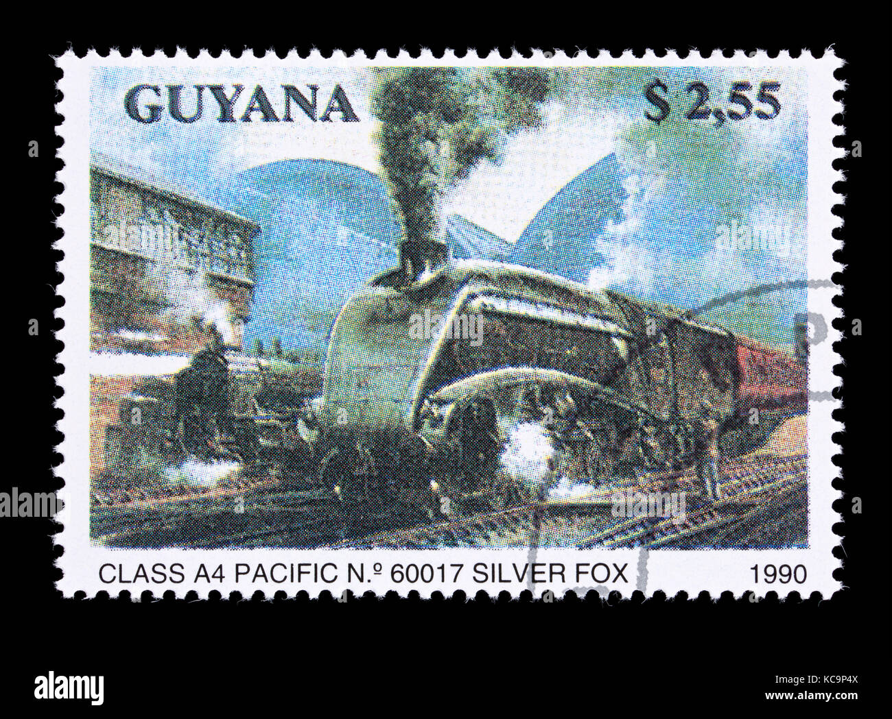 Postage stamp from Guyana depicting a Class A4 Pacific steam locomotive. Stock Photo